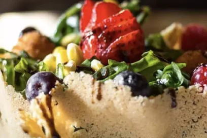Fruit and greens arranged in a crisp edible bowl